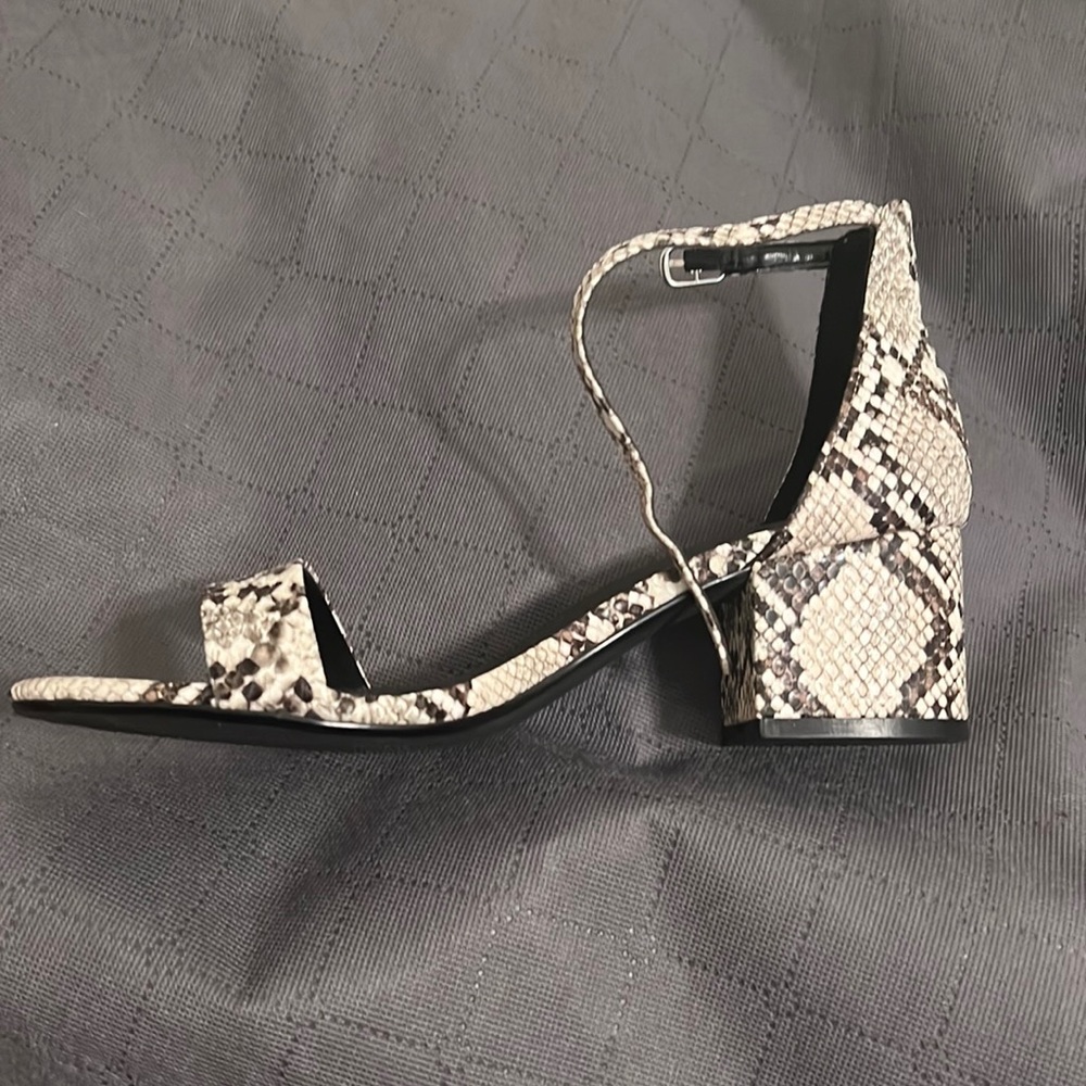 Amazon Essential snake skin print open toe sandals.